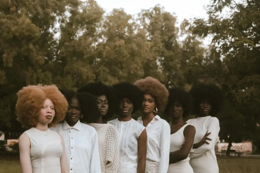 diverse ethnic women standing outside